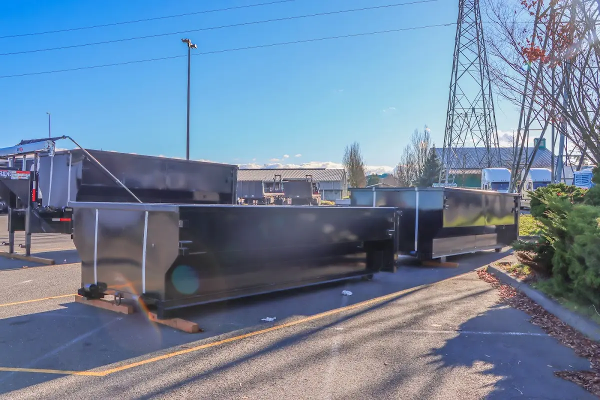 Roll-off dumpster ready for waste disposal at job site for Yard Waste Dumpster Rental in Dallas